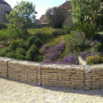 Aménagement jardin paysager séparation et clôture en gabions
